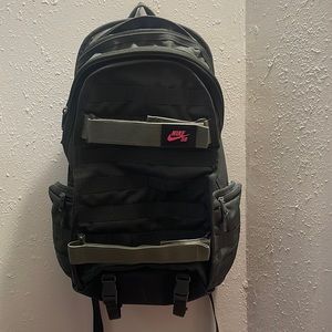 Army Green Nike backpack with pink Nike logo